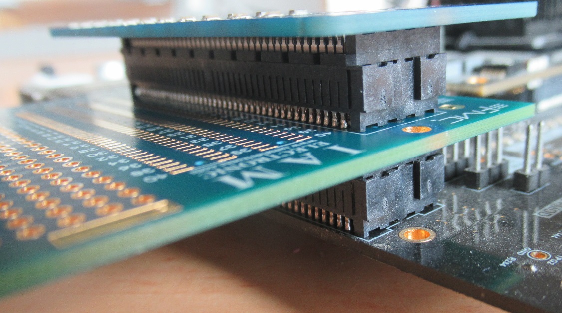FMC HPC to LPC Breakout module, stacked setup with loopback module.